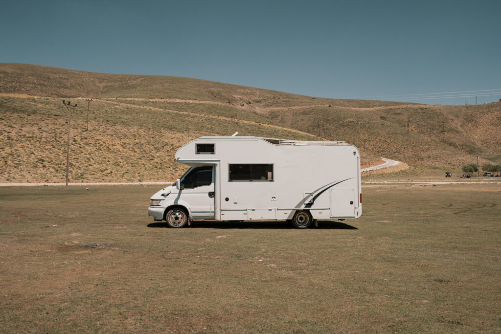 rv driving across the desert